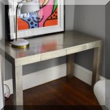 F31. Metal wrapped desk. 30”h x 48”w x 24”d 